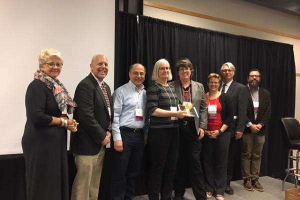 Caroline Breitenberger with 2017 University Academy of Teaching Founders Award and members of the Executive Council of the Academy of Teaching. 