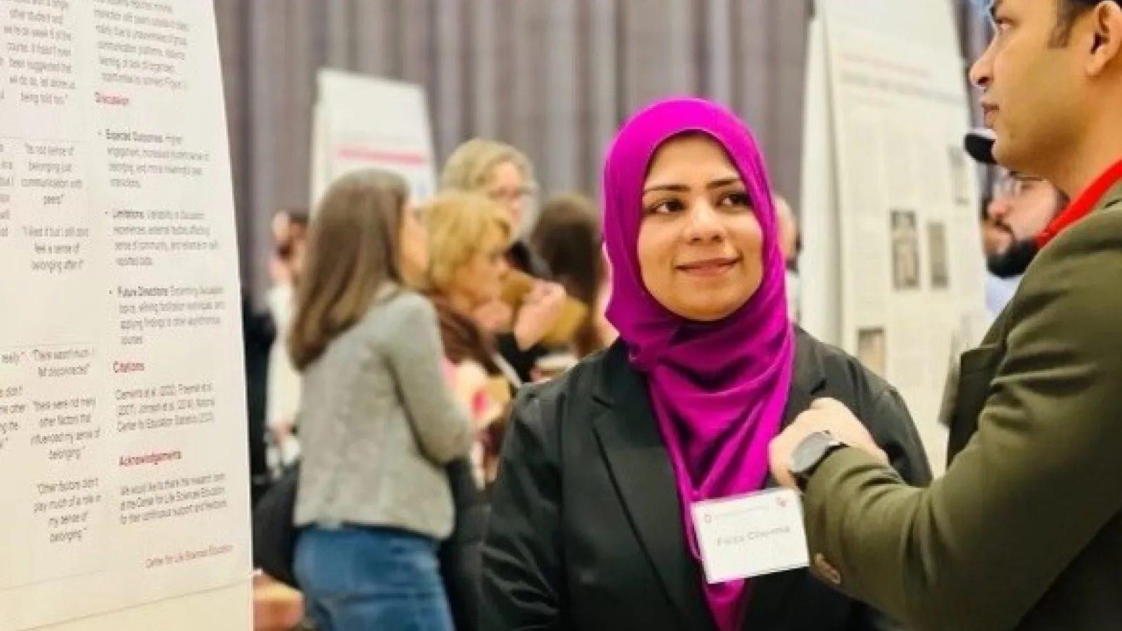 Faiza Cheema presenting poster at the Denman Undergrad Research Forum