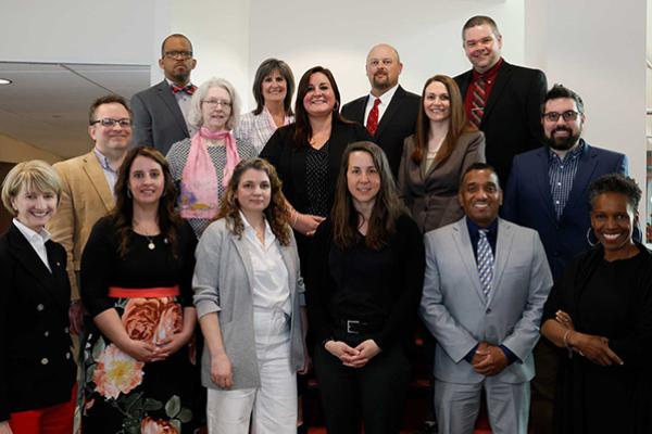 President Johnson, Provost Gilliam, and the 2023 winners of the University Distinguished Staff Award
